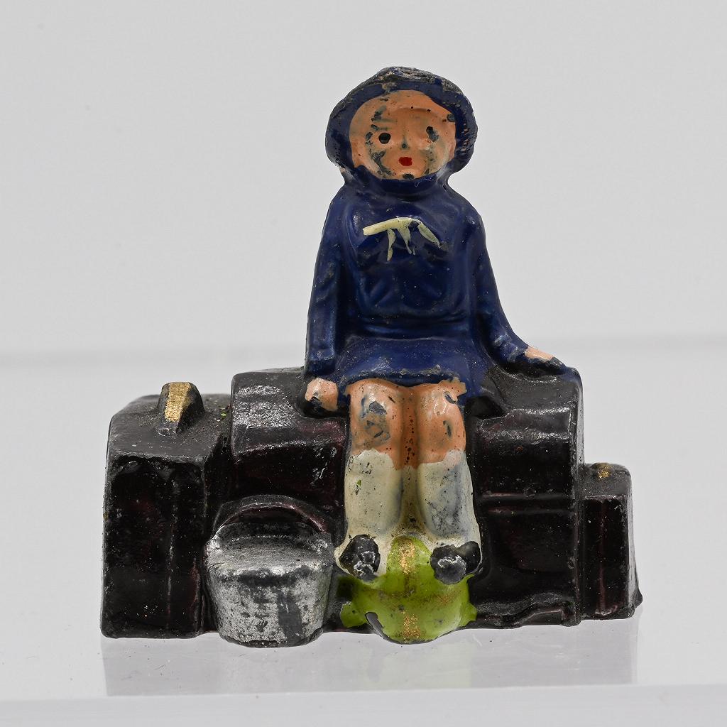 Johillco Girl Sitting on Trunk, Dark Blue Dress, Vintage Railroad Figure